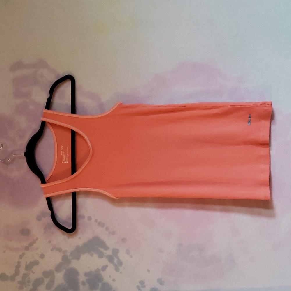 Hanes brand basic tank or undershirt.  Kids size XL, women's size S. Coral.